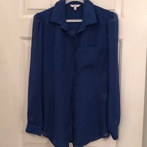 Royal blue button up blouse.